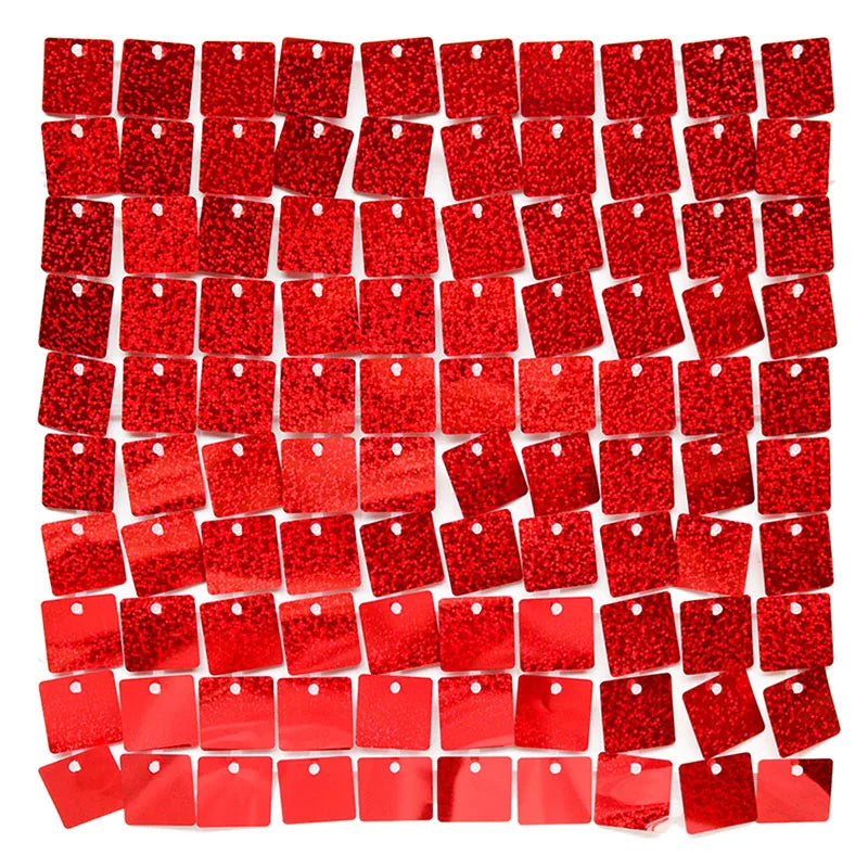 Red iridescent sequin shimmer wall panels used as a sparkling backdrop for celebrations