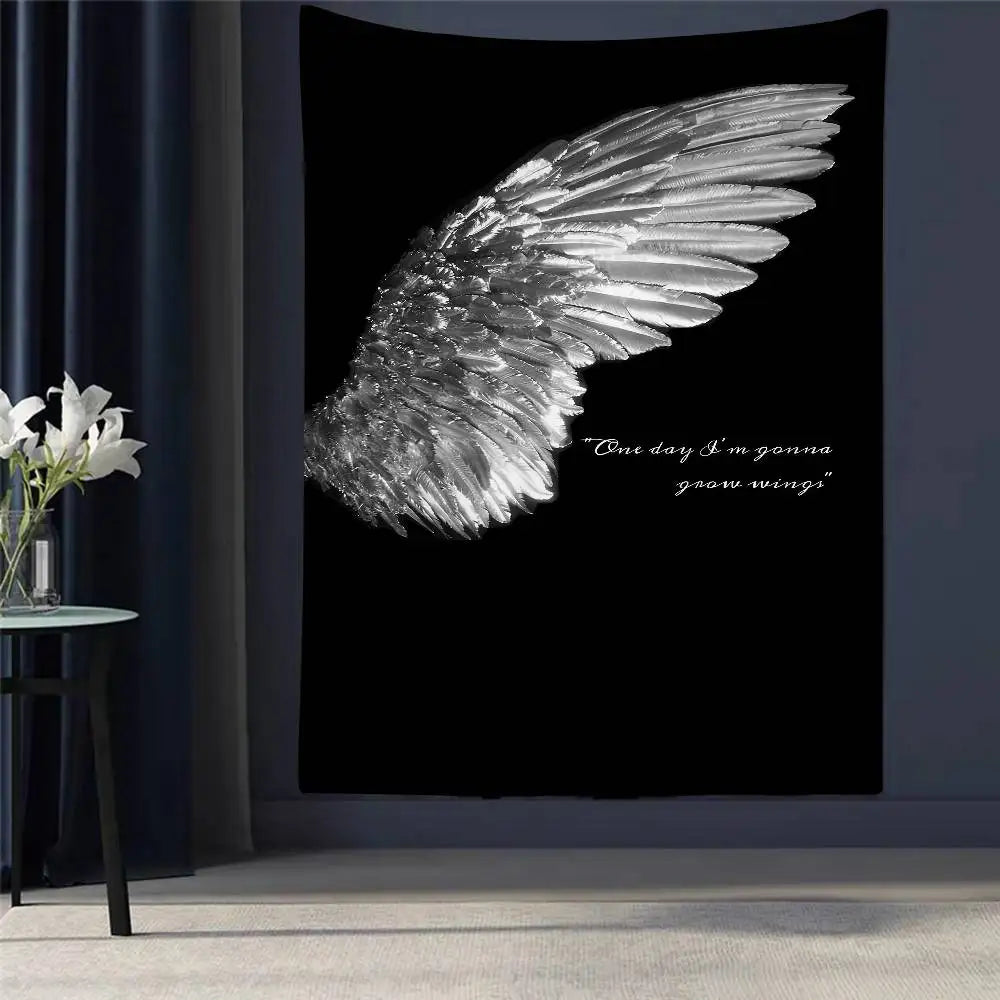 A black tapestry wall hanging featuring a white feathered angel wing design and the quote One day I'm gonna grow wings