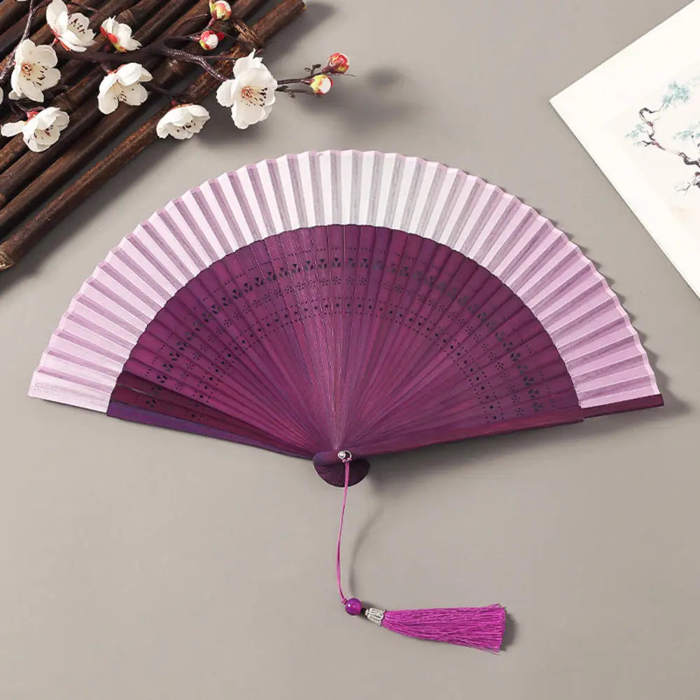 Traditional Bamboo Folding Fan with Solid Color Design
