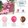 A collection of pastel pink and white balloons in various sizes and colors, including a large balloon arch display.