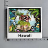 A set of fridge magnets featuring a tropical scene with lush green foliage and a figure in traditional attire.