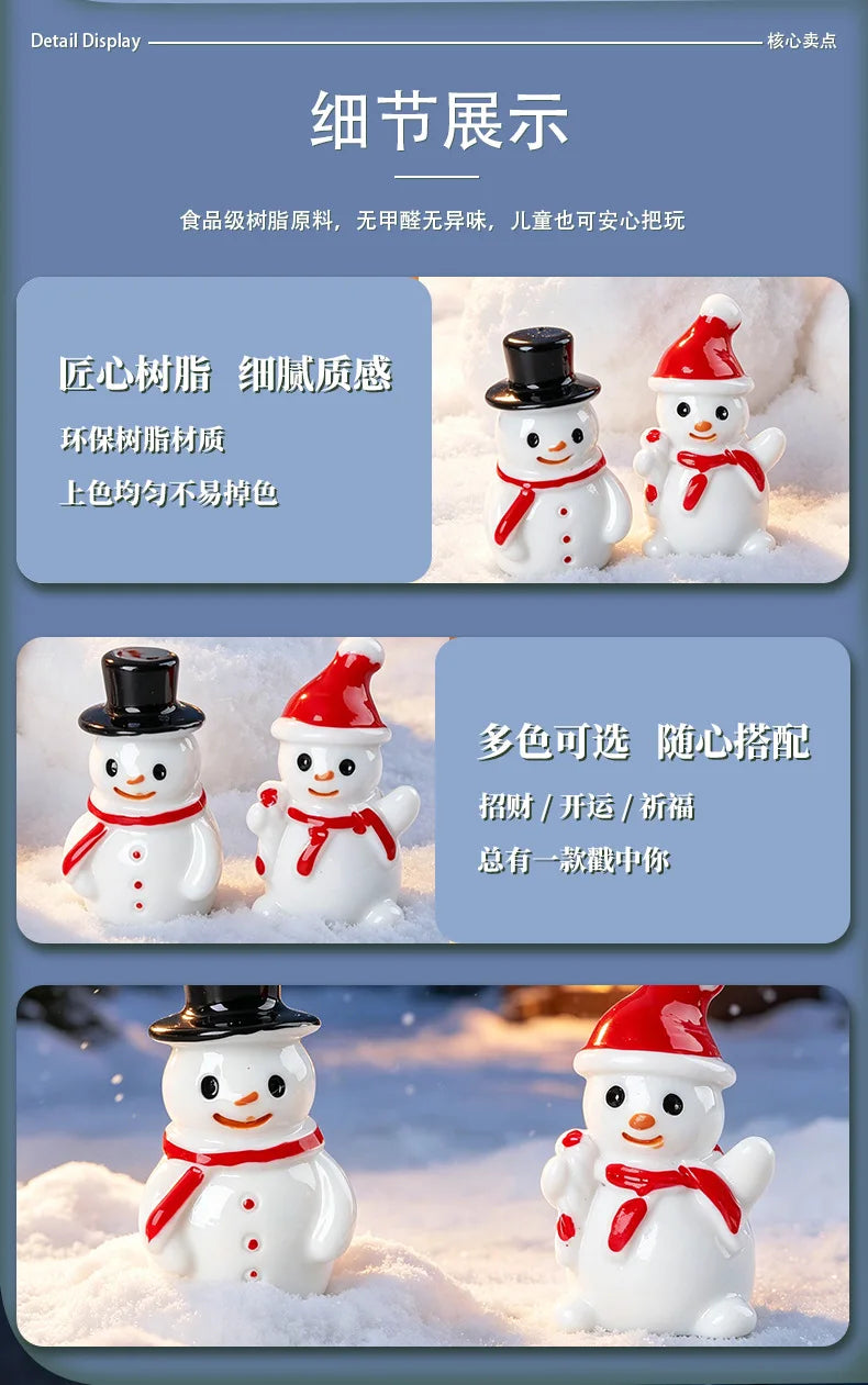 A set of white resin snowman figurines with red hats and scarves standing in snow.