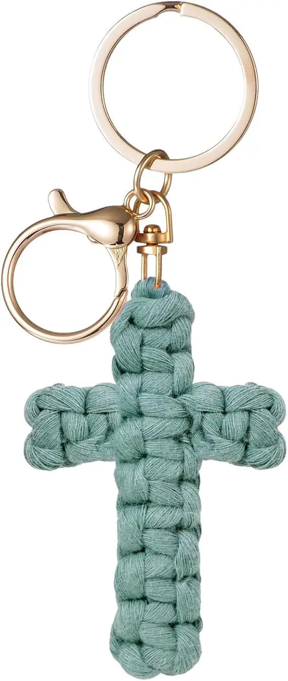 A teal woven cross keychain with a gold-toned metal clasp and circular ring.