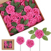 A box filled with pink foam rose artificial flowers on stems for weddings and home decor