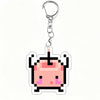 A pink pixel art charm of a character from Stardew Valley on a clear acrylic keychain.