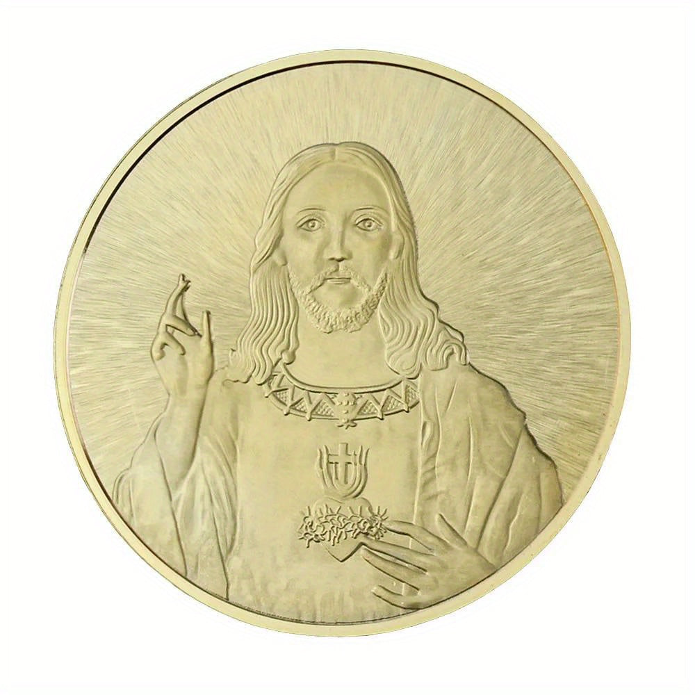 A gold-plated commemorative coin depicting Jesus Christ with radiating light.