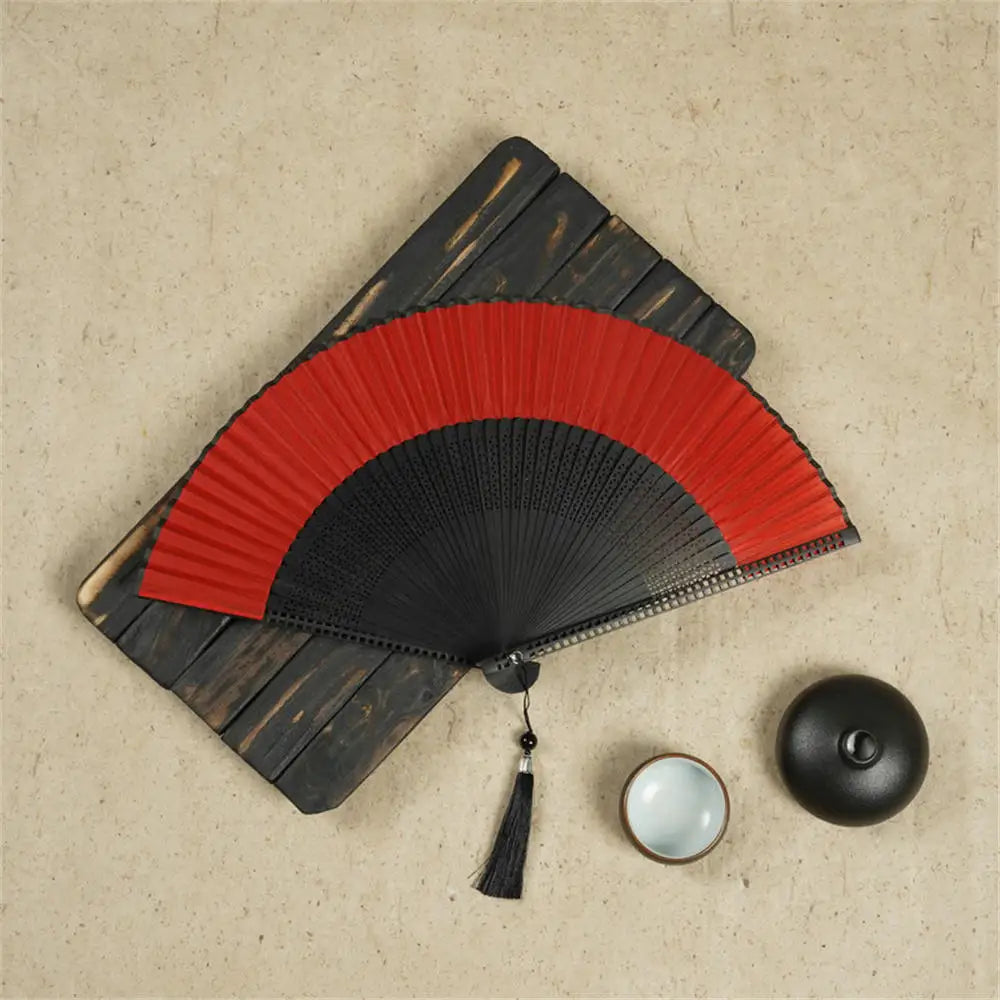 Traditional Bamboo Folding Fan with Solid Color Design