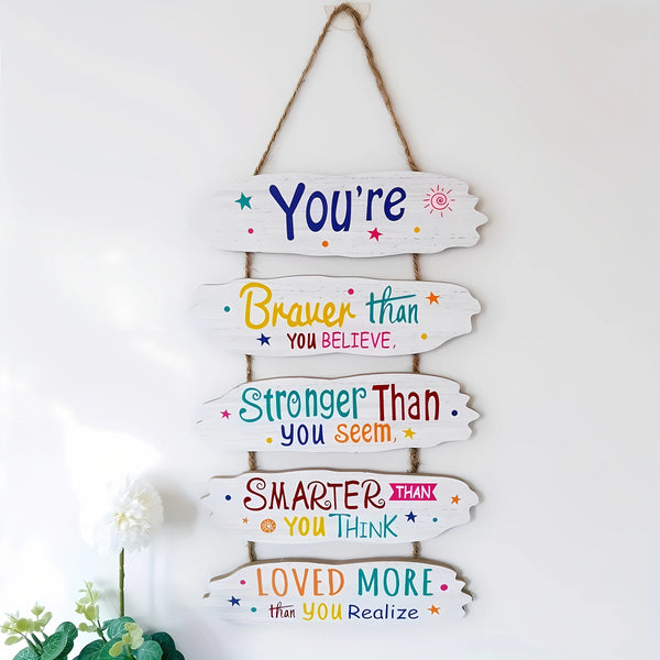 Rustic wooden inspirational hanging sign featuring text encouraging self-belief and strength.