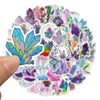 A circular arrangement of colorful crystal and gemstone decorative stickers on a white background.