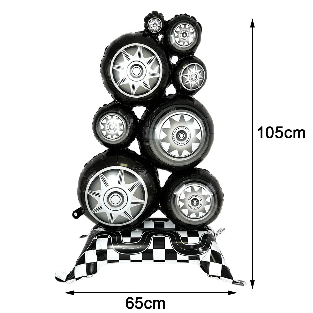 A stack of black and silver race car number balloons for birthday party decorations