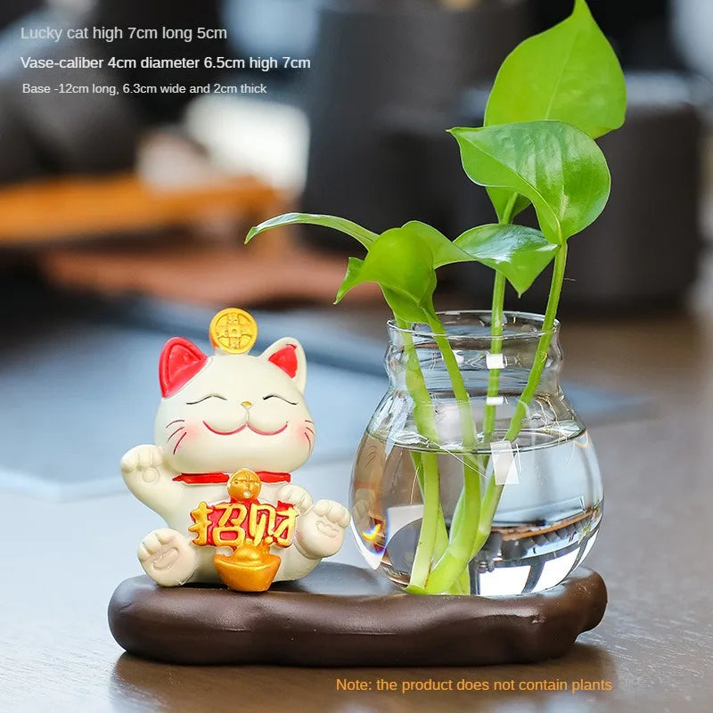 Mini resin desk ornament featuring a green ivy plant and a white lucky cat in a glass vase