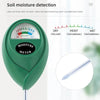 A green soil moisture meter with a scale showing dry, moist, and wet levels for indoor plant care.