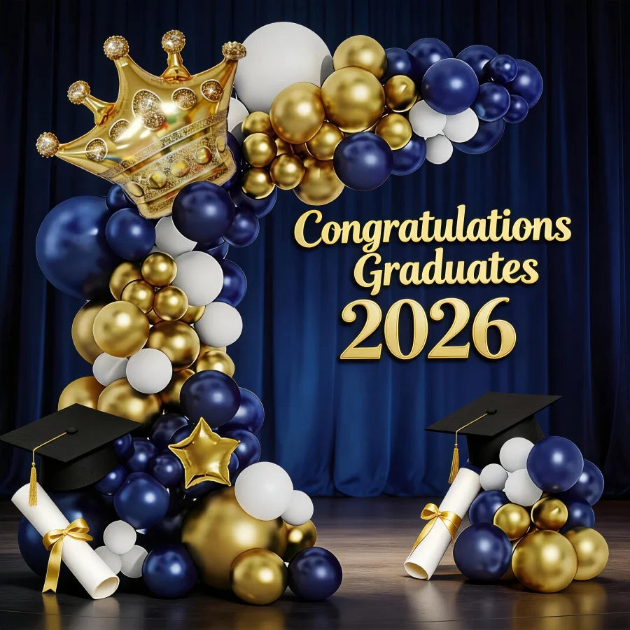 A balloon arch display featuring a gold crown, navy blue, and white balloons for graduation congratulations.