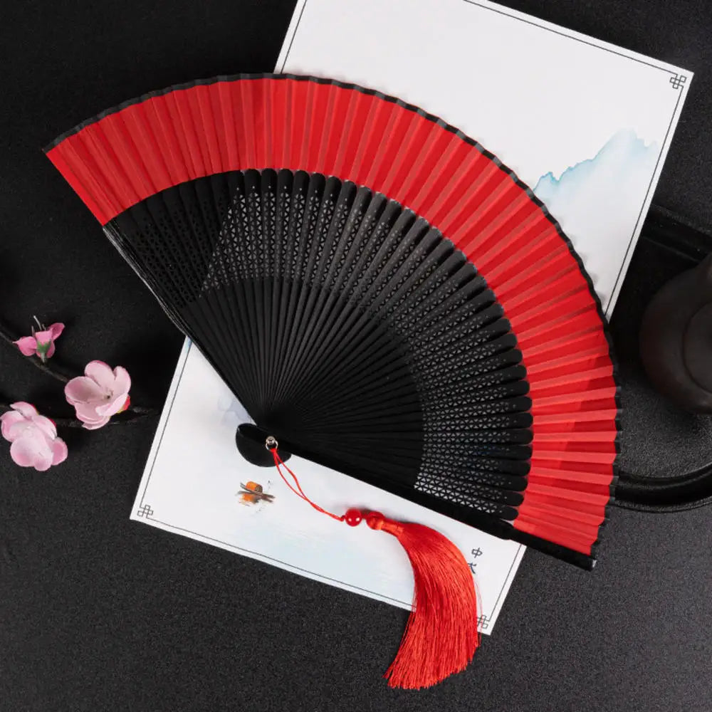 Traditional Bamboo Folding Fan with Solid Color Design