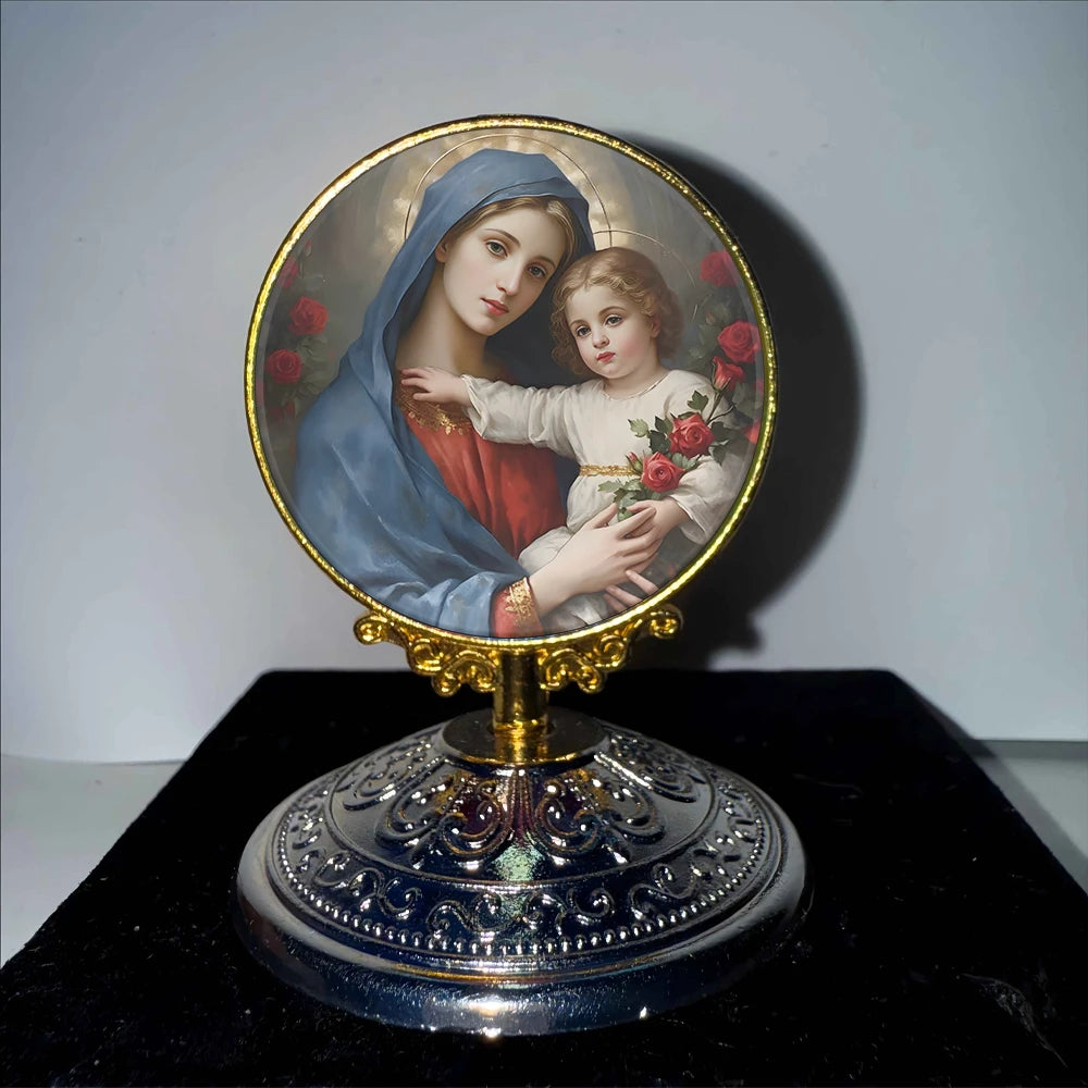 A round gold-framed painting depicting the Virgin Mary and the Christ Child.