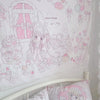A white tapestry wall hanging featuring a sweet dream theme with pink and purple cartoon characters and bows for bedroom deco