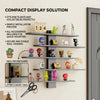 A set of four floating wall shelves displaying various small toys and plants for a compact display solution.