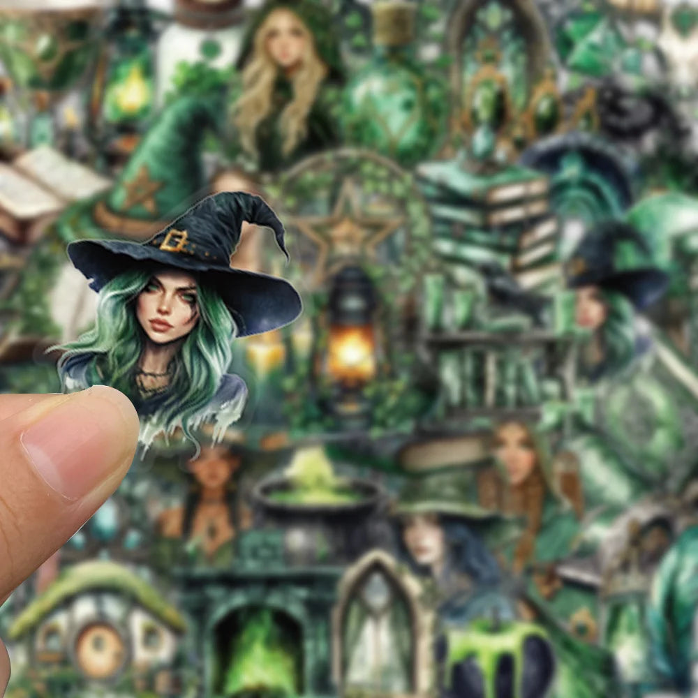 A close-up of a hand holding a witch-themed sticker pack featuring forest witches and decorative elements.