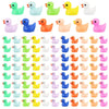 A collection of colorful resin mini mushroom figurines in various pastel and bright colors.