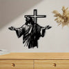 Black silhouette of Jesus with outstretched arms and a cross on a light gray wall.