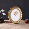 Vintage Resin Photo Frame with Golden Ornamental Details