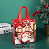 A red non-woven gift tote bag featuring a festive Christmas print with Santa and holiday scenes.