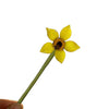 Handcrafted blue glass flower sculpture with yellow petals and a dark center