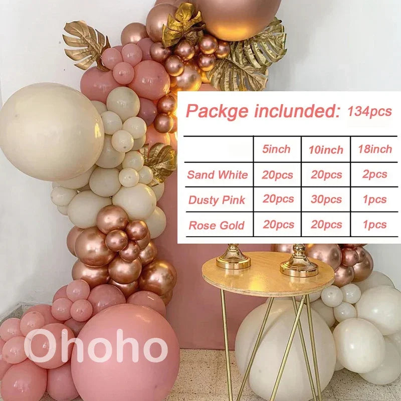 A pink and beige balloon garland arch featuring various sized balloons arranged on a white background.