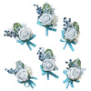 A set of six dusty blue silk rose boutonnieres featuring white and light green foliage and silver accents.