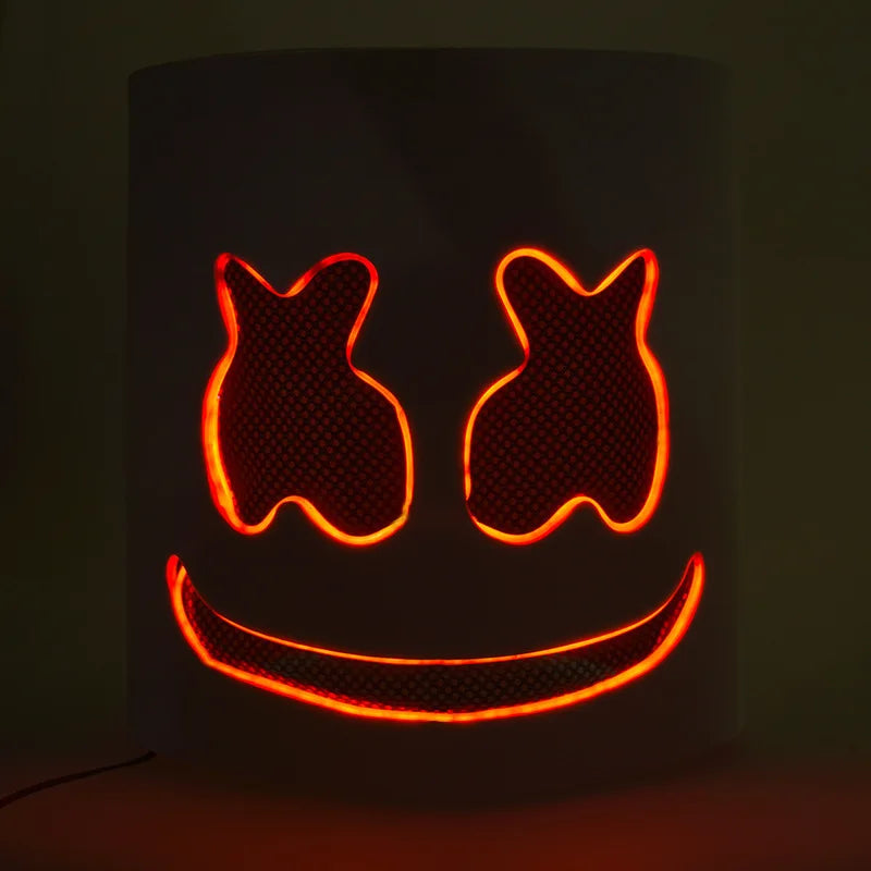 A glowing neon orange face mask design on a dark background.
