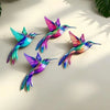Vintage metal hummingbird wall art featuring vibrant iridescent blue, purple, and green plumage.