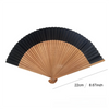 Elegant bamboo folding fan with black and natural wood stripes shown from the side.