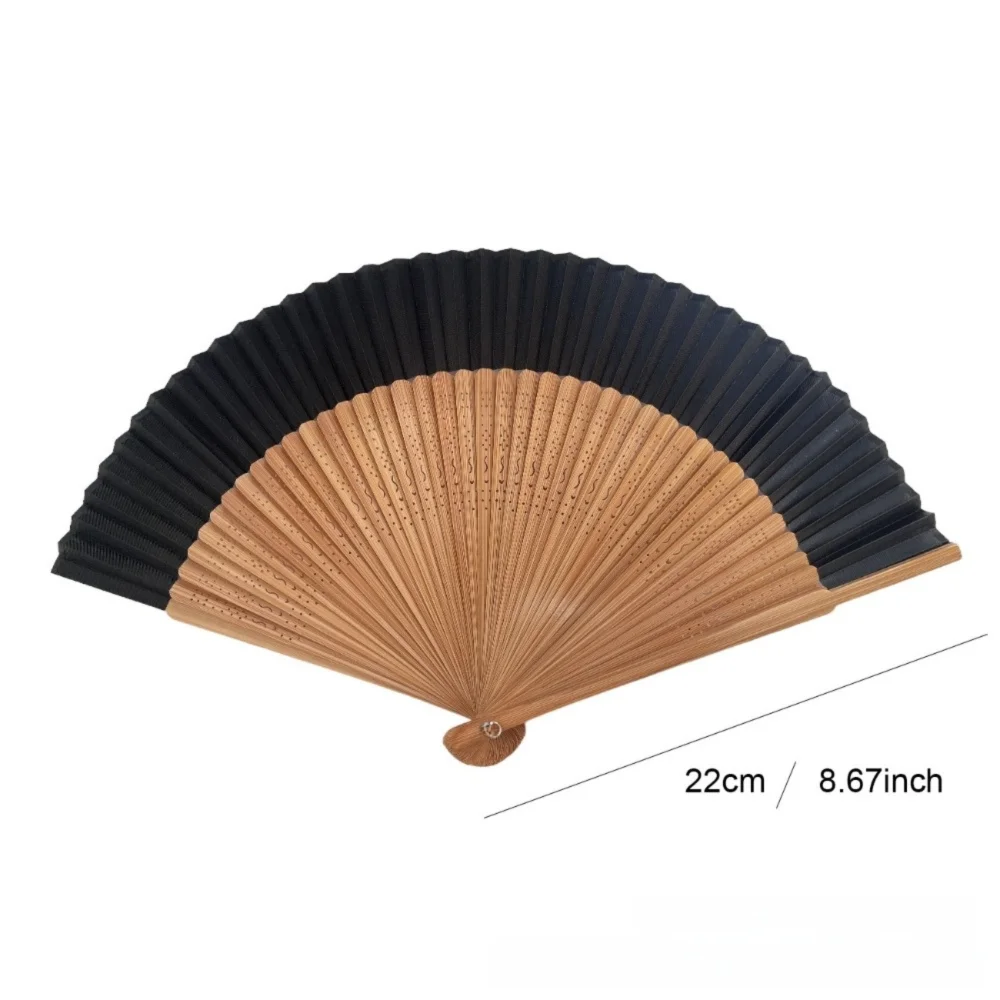 Elegant bamboo folding fan with black and natural wood stripes shown from the side.