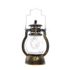 A brass-colored LED lantern night light with a clear glass globe and decorative metalwork.