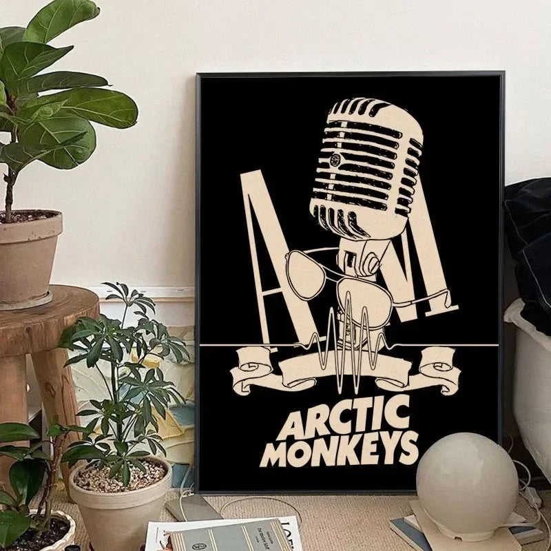 A black canvas art print featuring a stylized illustration of the Arctic Monkeys band logo.