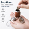 A hand holds a small brown tin coin storage container with a silver chain and several coins, demonstrating easy open and secu