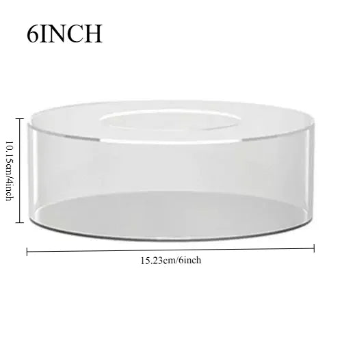 A clear acrylic cake display stand with a 6-inch diameter and 10.15cm height.