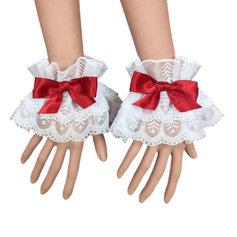White ruffled lace wrist cuffs with red satin bow accents