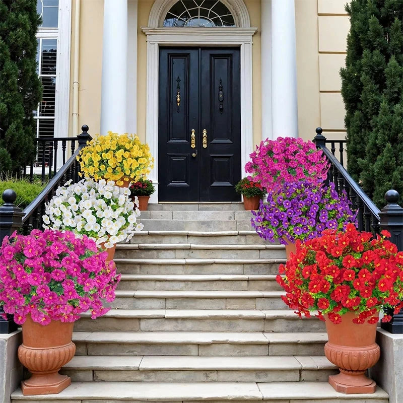 A set of artificial morning glory and eucalyptus flower stems displayed in terracotta pots on a stone staircase.
