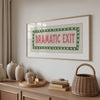 A framed canvas print featuring the text Dramatic Exit in pink and green on a light background.