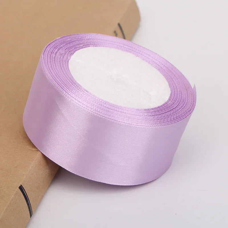 Roll of light purple satin ribbon for crafts and gift wrapping