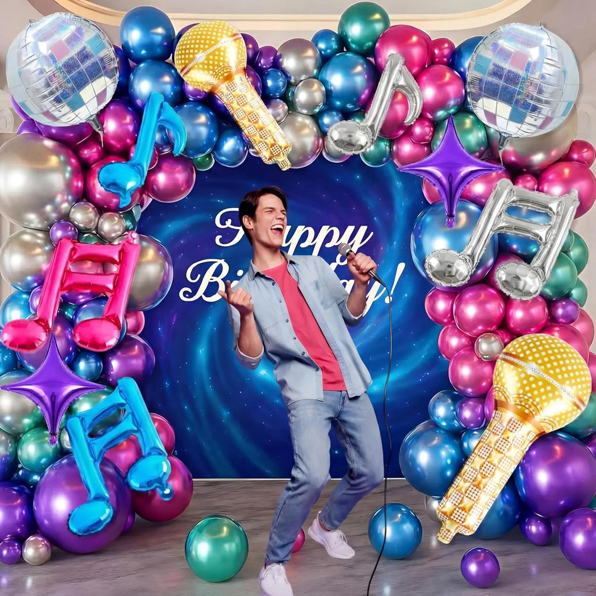 A colorful arrangement of foil balloons shaped like musical notes and a treble clef against a blue background.