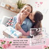 A smiling woman hugs a girl, presenting a puzzle-shaped acrylic desk plaque with a message of love.