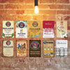 A collection of vintage beer metal signs featuring various German beer brands like Paulaner and Budweiser