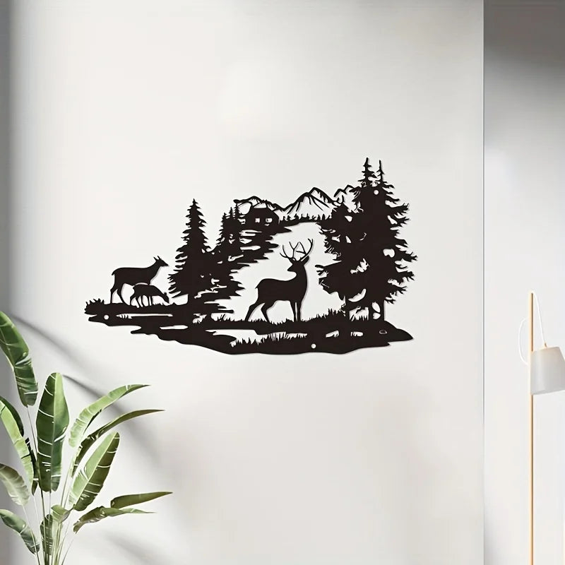 Black silhouette wall art depicting deer and evergreen trees in a forest landscape