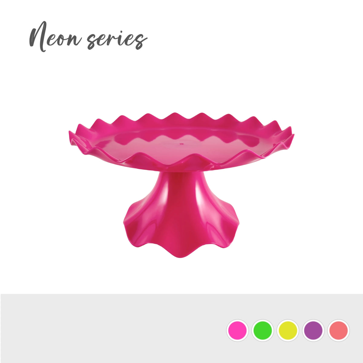 A bright pink plastic cake stand with a scalloped edge for parties and events.