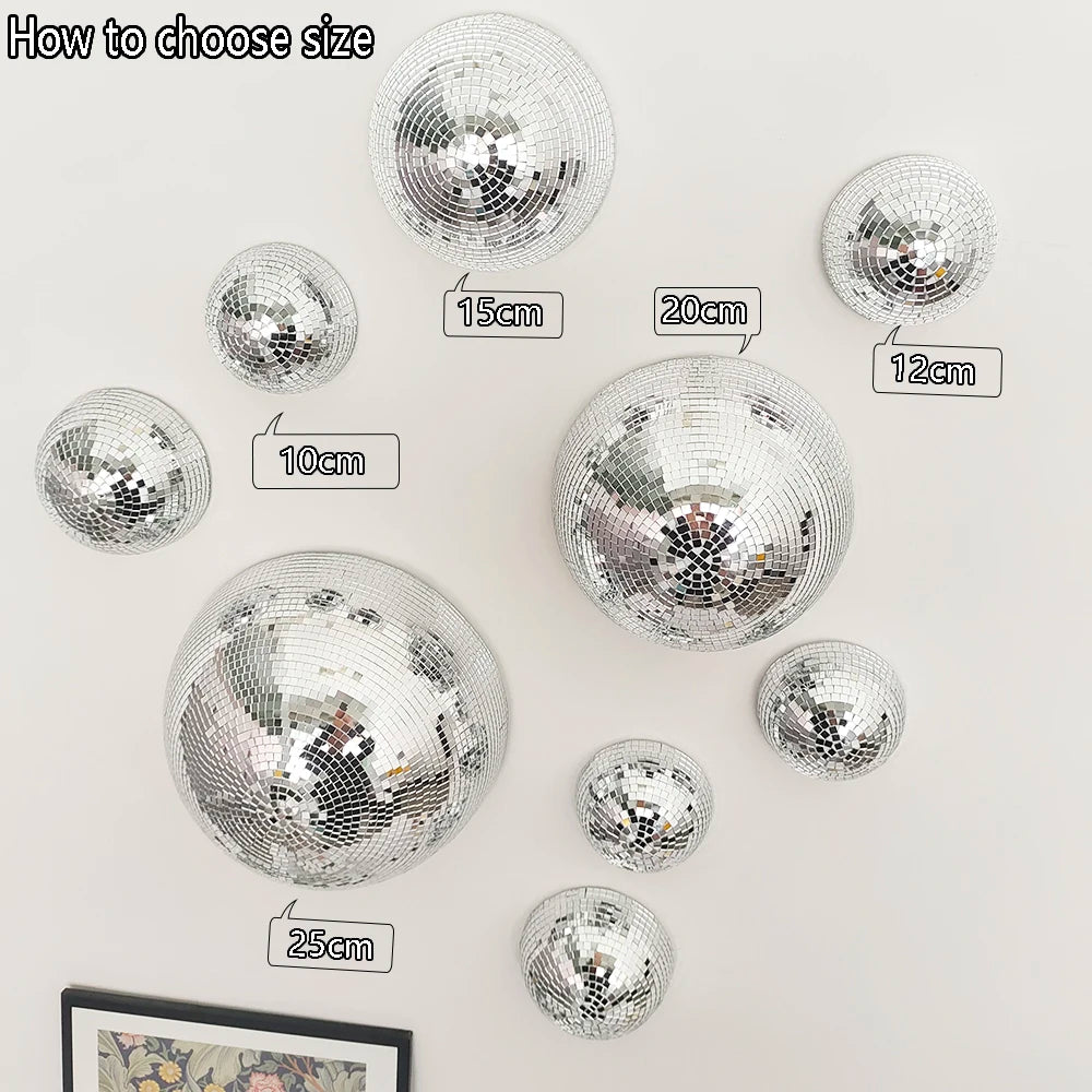 Various sizes of silver disco balls are displayed with measurements ranging from 10cm to 25cm.