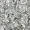 A close-up view of silver silk rose petals for weddings and events.