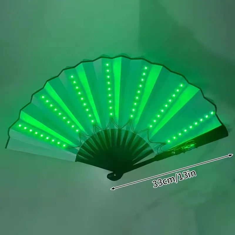 A green folding LED fan with light rays is shown, angled upwards.