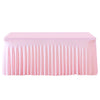 Pink elastic fitted spandex tablecloth draped on a rectangular table.